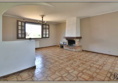 Annonces immobilières à Buxerolles 86180 - Séjour lumineux avec cheminée - agence immobilière