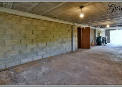 Annonces immobilières à Buxerolles 86180 - Intérieur du garage sous-sol maison - agence immobilière